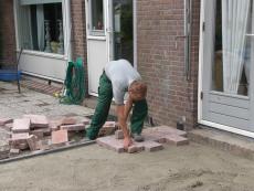 Bestrating leggen